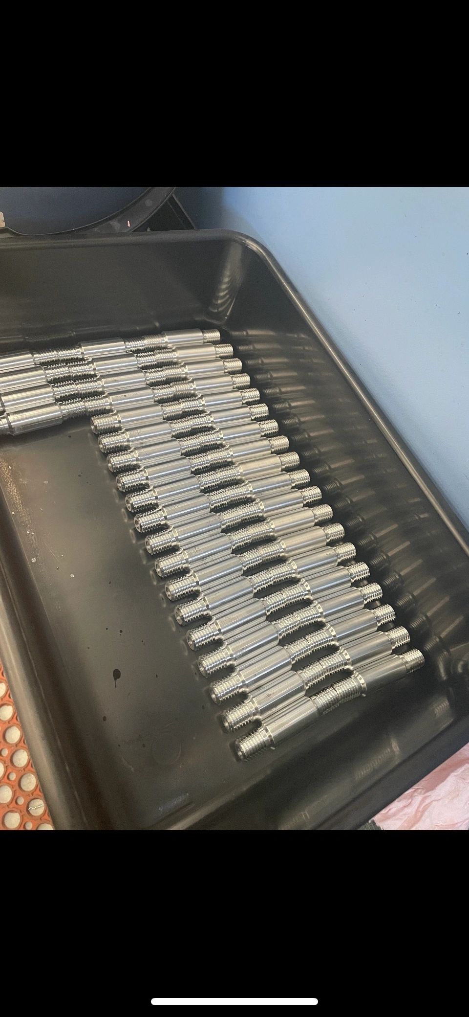 Production run of threaded studs