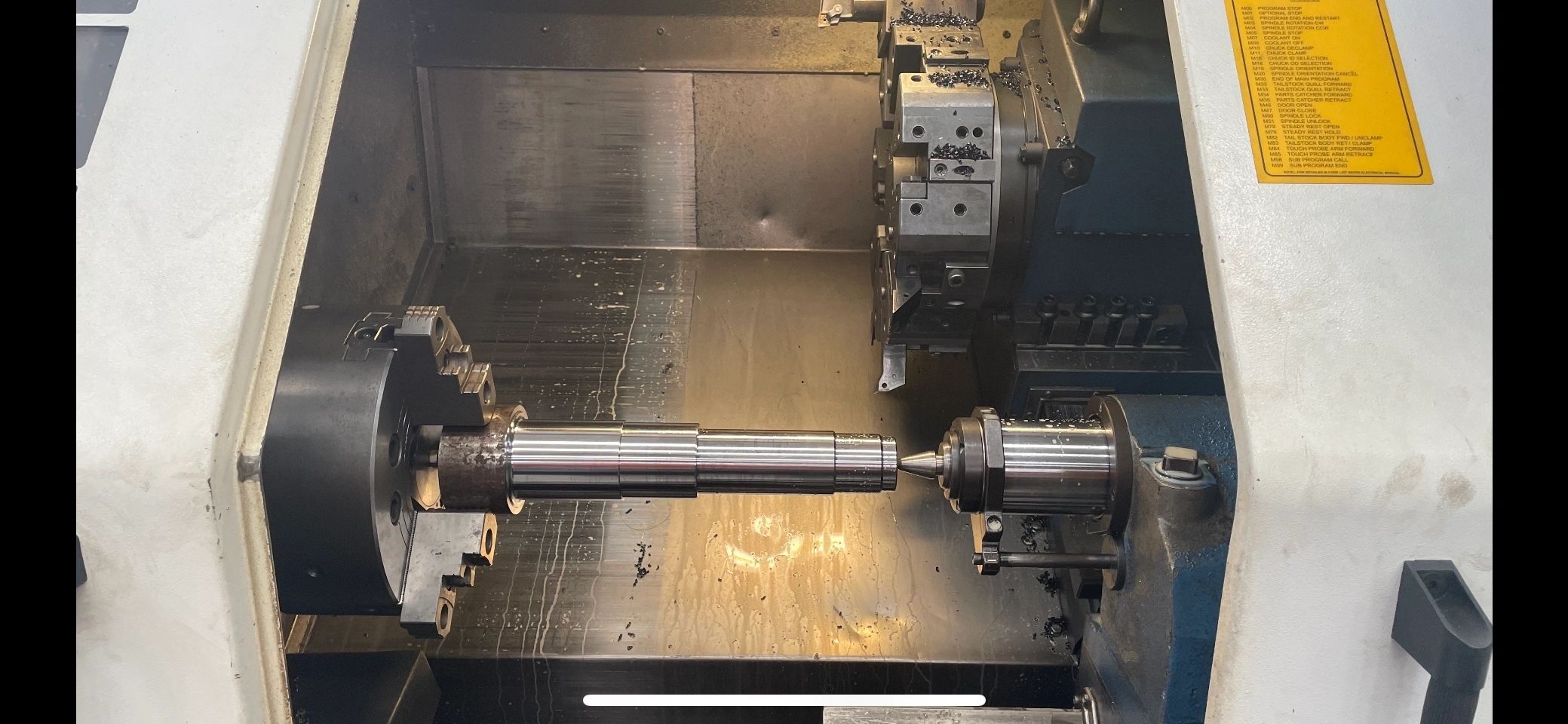 CNC lathe with shaft mounted