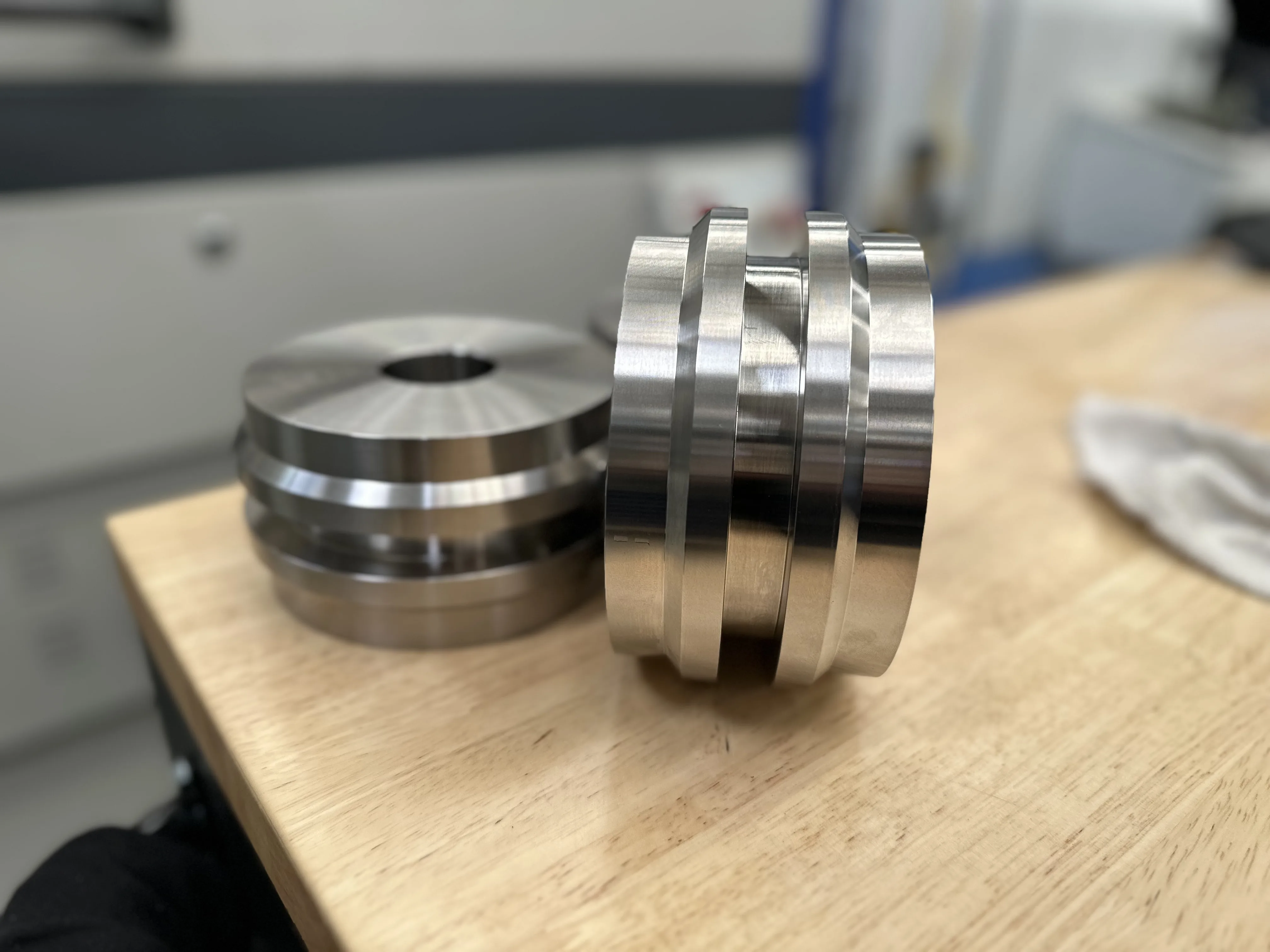 Stack of large stepped steel flanges with central bore